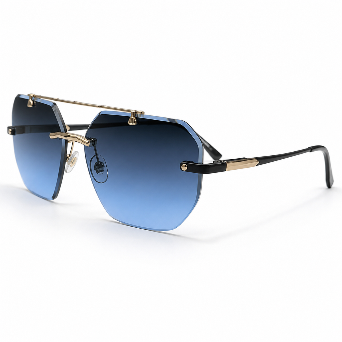 Sunglasses with blue gradient lenses and gold frame on a white background