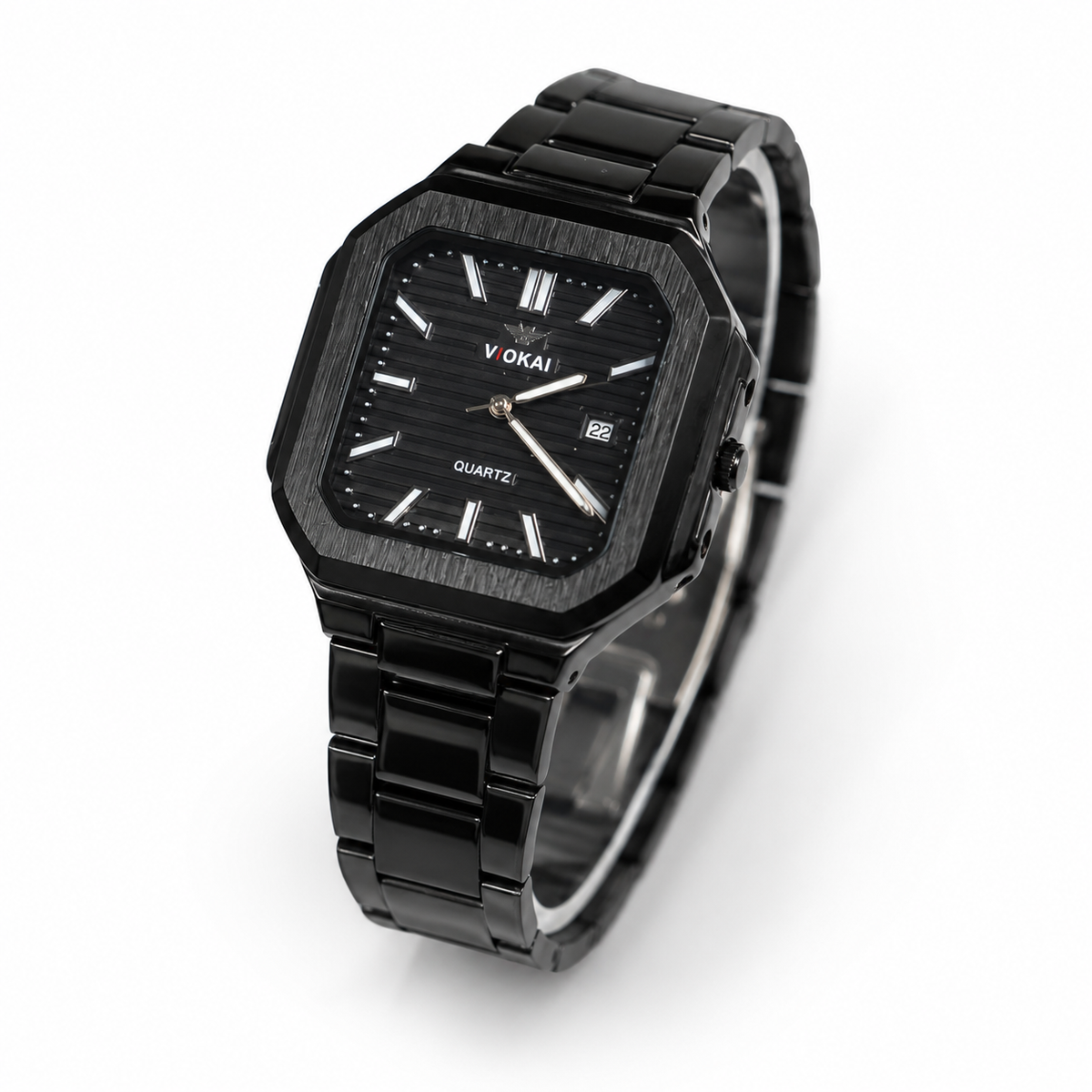 Black wristwatch with a metallic band on a white background