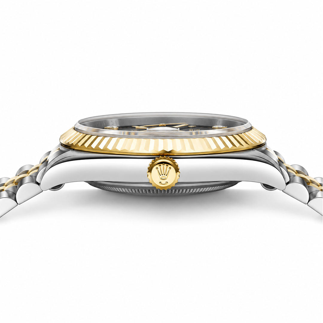 Close-up of a Rolex watch with gold and silver accents on a white background