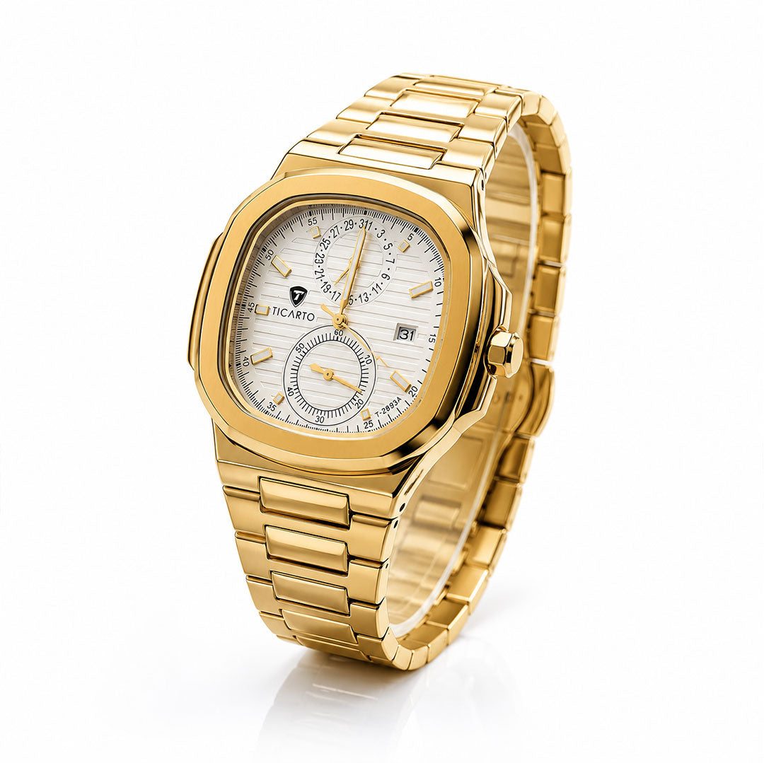 Gold wristwatch with a detailed face on a white background